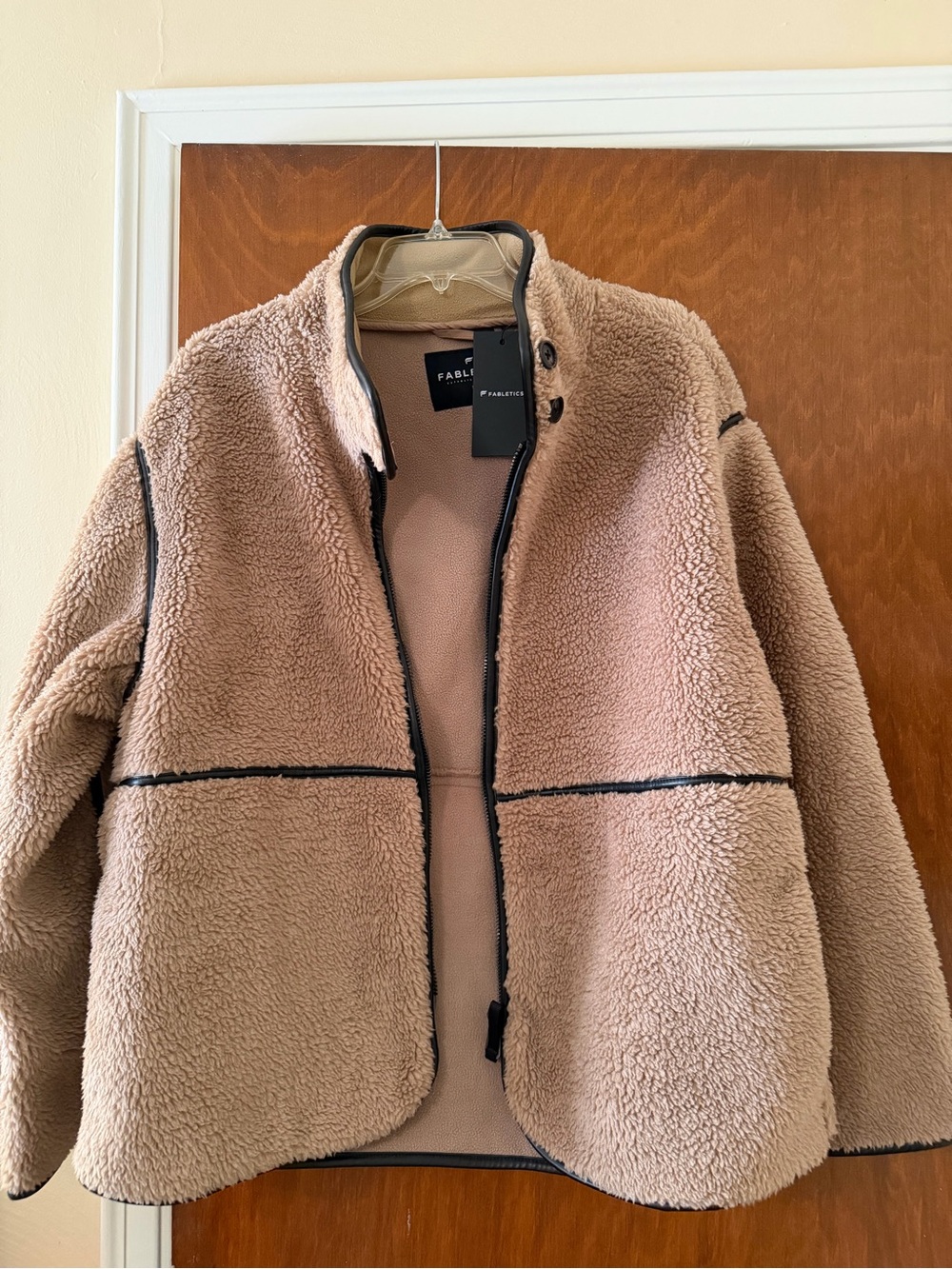 Fabletics Teddy Jacket in Light Brown with Black Trim